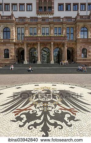 "Mosaic, imperial eagle of the German Empire from 1888 on, Wappeninsel, New Town Hall, Schlossplatz square, Wiesbaden, Hesse, Germany, Europe" View Large Photo Image Stock Image - "Mosaic, imperial eagle of the German Empire from 1888 on, Wappeninsel, New Town Hall, Schlossplatz square, Wiesbaden, Hesse, Germany, Europe". Fotosearch