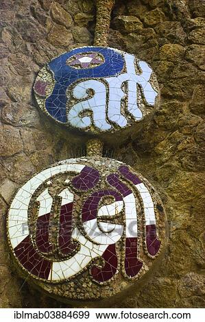 Stock Photo - "Mosaic lettering on the outside wall of Park Guell, Barcelona, Catalonia, Spain, Europe". Fotosearch