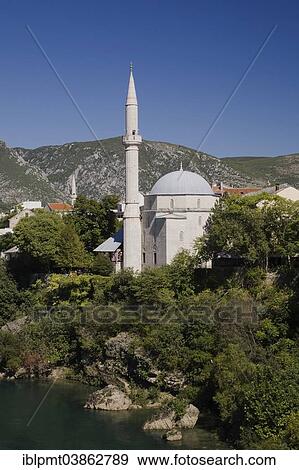Stock Photo - "Mosque and Neretva River, historic centre, Mostar, Bosnia and Herzegovina, Europe". Fotosearch
