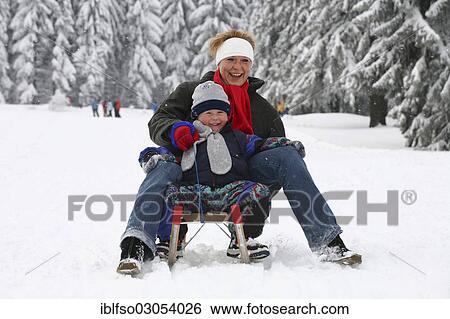 "Mother and boy, four years, sledging, Thuringer Wald, Thuringia, Germany, Europe" View Large Photo Image Stock Photograph - "Mother and boy, four years, sledging, Thuringer Wald, Thuringia, Germany, Europe". Fotosearch