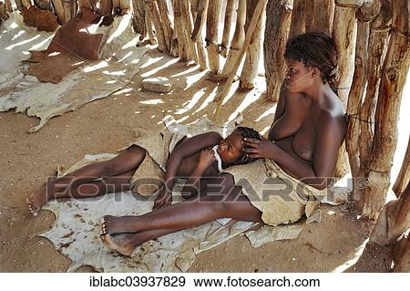 "Mother and child, Damara Living Museum, near Twyfelfontein, Namibia, Africa" View Large Photo Image Stock Photo - "Mother and child, Damara Living Museum, near Twyfelfontein, Namibia, Africa". Fotosearch