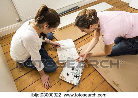 "Mother and daughter working together to assemble a bed in the daughter's room, bed assembly set, Germany, Europe" View Large Photo Image Stock Image - "Mother and daughter working together to assemble a bed in the daughter's room, bed assembly set, Germany, Europe". Fotosearch