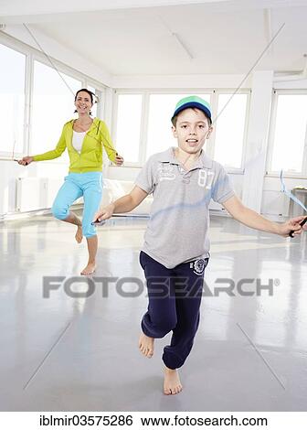 "Mother and son skipping rope, Germany, Europe" View Large Photo Image Stock Photograph - "Mother and son skipping rope, Germany, Europe". Fotosearch