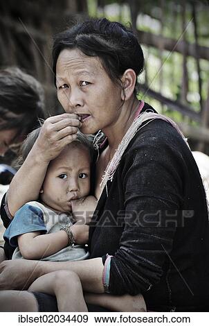 "Mother breastfeeding her child, Laos, Southeast Asia, Asia" View Large Photo Image Stock Photo - "Mother breastfeeding her child, Laos, Southeast Asia, Asia". Fotosearch