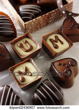 Stock Photo - "Mother's day chocolates spelling the word """"Mum""""". Fotosearch