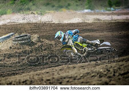 "Motocross rider falling in a curve, Grevenbroich, North Rhine-Westphalia, Germany, Europe" View Large Photo Image Picture - "Motocross rider falling in a curve, Grevenbroich, North Rhine-Westphalia, Germany, Europe". Fotosearch