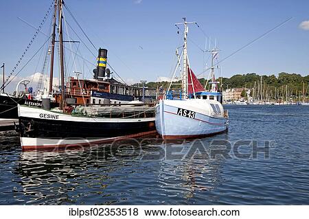 "Motor cargo ship, Gesine, in the historic port of Flensburg, Schleswig-Holstein, Germany, Europe" View Large Photo Image Stock Photo - "Motor cargo ship, Gesine, in the historic port of Flensburg, Schleswig-Holstein, Germany, Europe". Fotosearch