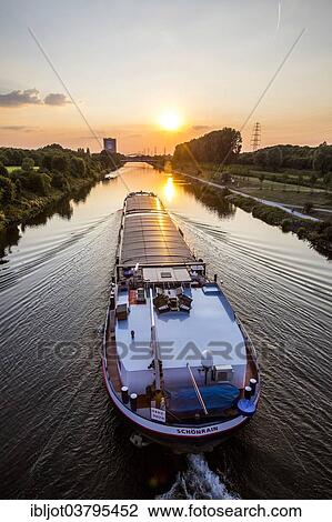 "Motor cargo ship MS Schoenrain, Rhine-Herne Canal, Oberhausen, North Rhine-Westphalia, Germany, Europe" View Large Photo Image Stock Image - "Motor cargo ship MS Schoenrain, Rhine-Herne Canal, Oberhausen, North Rhine-Westphalia, Germany, Europe". Fotosearch