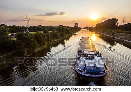 "Motor cargo ship MS Schoenrain, Rhine-Herne Canal, Oberhausen, North Rhine-Westphalia, Germany, Europe" View Large Photo Image Stock Image - "Motor cargo ship MS Schoenrain, Rhine-Herne Canal, Oberhausen, North Rhine-Westphalia, Germany, Europe". Fotosearch