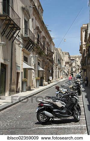 "Motor scooters in the historic town centre, Noto, province of Syracuse, Sicily, Italy, Europe" View Large Photo Image Stock Photo - "Motor scooters in the historic town centre, Noto, province of Syracuse, Sicily, Italy, Europe". Fotosearch