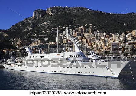 Stock Photo - "Motor yacht Atlantis II at Port Hercule, Monaco, Monaco, Europe". Fotosearch
