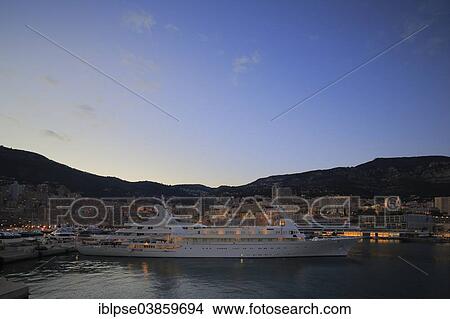 "Motor yacht Atlantis II in the evening in Port Hercule, Principality of Monaco" View Large Photo Image Picture - "Motor yacht Atlantis II in the evening in Port Hercule, Principality of Monaco". Fotosearch