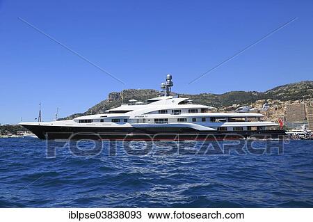 "Motor yacht Attessa IV, ex Evergreen, at anchor in front of the Principality of Monaco" View Large Photo Image Stock Image - "Motor yacht Attessa IV, ex Evergreen, at anchor in front of the Principality of Monaco". Fotosearch
