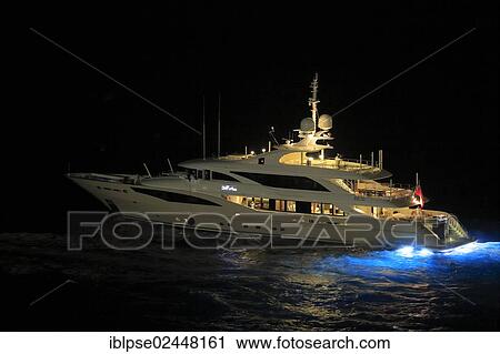 "Motor yacht """"Belle Anna"""", built by shipyard ISA Yachts, 49. 95m in length, built in 2012, sailing out of Port Hercule at night, Monaco, Cote d'Azur, Mediterranean, Europe" View Large Photo Image Stock Image - "Motor yacht """"Belle Anna"""", built by shipyard ISA Yachts, 49. 95m in length, built in 2012, sailing out of Port Hercule at night, Monaco, Cote d'Azur, Mediterranean, Europe". Fotosearch