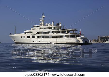 Picture - "Motor yacht, Ecstasea, built by Feadship, at anchor, Monaco, Europe". Fotosearch