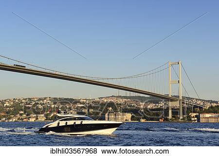 "Motor yacht on the Bosphorus, Bosphorus Bridge and Beylerbeyi Palace on the Asian shore, seen from Ortakoey, Istanbul, European side, Istanbul Province, Turkey, European side, Europe" View Large Photo Image Stock Photo - "Motor yacht on the Bosphorus, Bosphorus Bridge and Beylerbeyi Palace on the Asian shore, seen from Ortakoey, Istanbul, European side, Istanbul Province, Turkey, European side, Europe". Fotosearch