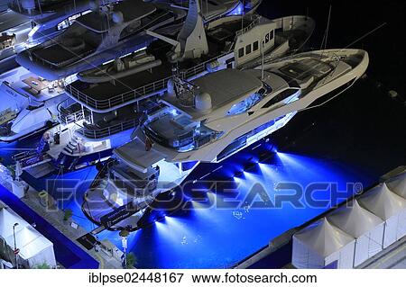 "Motor yacht """"Stella"""", built by shipyard """"Sunseeker"""", 34. 53 m in length, built in 2011, with underwater lights in Port Hercule at night, during the Monaco Yacht Show, Monaco, Cote d'Azur, Mediterranean, Europe" View Large Photo Image Stock Photo - "Motor yacht """"Stella"""", built by shipyard """"Sunseeker"""", 34. 53 m in length, built in 2011, with underwater lights in Port Hercule at night, during the Monaco Yacht Show, Monaco, Cote d'Azur, Mediterranean, Europe". Fotosearch