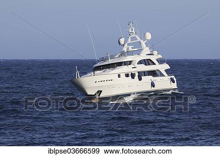 "Motor yacht Taiba in choppy seas, Beaulieu-sur-Mer, Departement Alpes-Maritimes, Region Provence-Alpes-Cote d’Azur, France, Europe" View Large Photo Image Stock Photo - "Motor yacht Taiba in choppy seas, Beaulieu-sur-Mer, Departement Alpes-Maritimes, Region Provence-Alpes-Cote d’Azur, France, Europe". Fotosearch