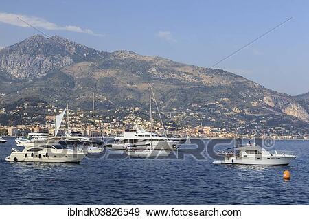 "Motor yachts and sailboats moored off the coast of Roquebrune-Cap-Martin, Menton, Provence-Alpes-Cote d'Azur, France, Europe" View Large Photo Image Stock Photo - "Motor yachts and sailboats moored off the coast of Roquebrune-Cap-Martin, Menton, Provence-Alpes-Cote d'Azur, France, Europe". Fotosearch