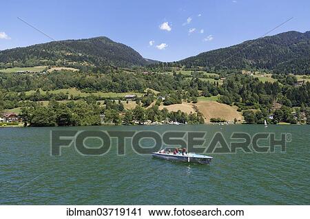"Motorboat on Brennsee or Feldsee lake, Feld am See, Carinthia, Austria, Europe" View Large Photo Image Stock Image - "Motorboat on Brennsee or Feldsee lake, Feld am See, Carinthia, Austria, Europe". Fotosearch
