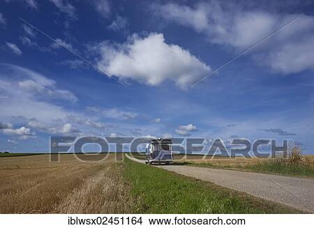 Picture - "Motorhome driving on a narrow road, Finistere, Brittany, France, Europe, PublicGround, Europe". Fotosearch