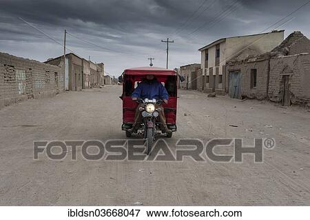 "Mototaxi in a Bolivian village, Altiplano, Uyuni, Bolivia, South America" View Large Photo Image Stock Photo - "Mototaxi in a Bolivian village, Altiplano, Uyuni, Bolivia, South America". Fotosearch