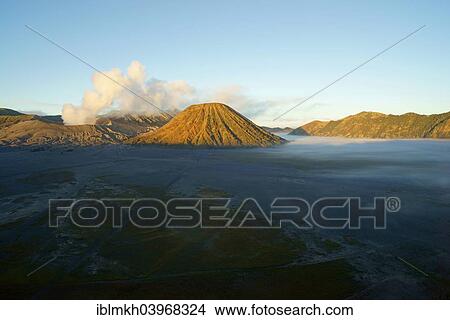 "Mount Bromo, smoking, Mount Batok, right, Mount Kursi and Mount Gunung Semeru at the back, volcanoes, Bromo-Tengger-Semeru National Park, Java, Indonesia, Asia" View Large Photo Image Picture - "Mount Bromo, smoking, Mount Batok, right, Mount Kursi and Mount Gunung Semeru at the back, volcanoes, Bromo-Tengger-Semeru National Park, Java, Indonesia, Asia". Fotosearch