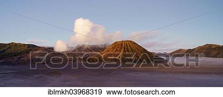Stock Photo - "Mount Bromo, smoking, Mount Batok, right, Mount Kursi and Mount Gunung Semeru at the back, volcanoes, Bromo-Tengger-Semeru National Park, Java, Indonesia, Asia". Fotosearch
