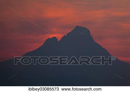 Stock Image - "Mount Mikeno volcano just before sunrise, dawn, Goma, Nord-Kivu, Congo, Democratic Republic of the Congo, Africa". Fotosearch