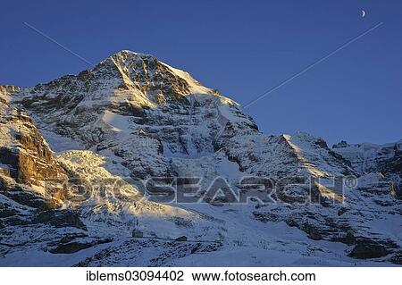 Stock Image - "Mount Moench in the evening light, Grindelwald, Berner Oberland, Canton of Bern, Switzerland, Europe". Fotosearch