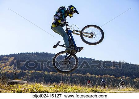 Mountain biker, bike park, downhill mountain bike trail at the Winterberg bobsleigh track, Sauerland, North Rhine-Westphalia, Germany, Europe View Large Photo Image Stock Photo - Mountain biker, bike park, downhill mountain bike trail at the Winterberg bobsleigh track, Sauerland, North Rhine-Westphalia, Germany, Europe. Fotosearch