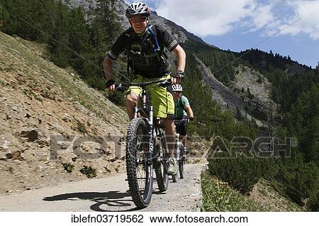 "Mountain biker in Valle Alpisella, Valle Alpisella, Livigno, Sondrio province, Lombardy, Italy, Europe" View Large Photo Image Stock Image - "Mountain biker in Valle Alpisella, Valle Alpisella, Livigno, Sondrio province, Lombardy, Italy, Europe". Fotosearch