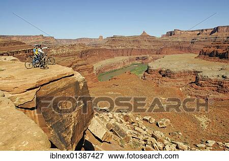 "Mountain bikers, Colorado River, White Rim Trail, Moab, Utah, USA" View Large Photo Image Stock Photo - "Mountain bikers, Colorado River, White Rim Trail, Moab, Utah, USA". Fotosearch