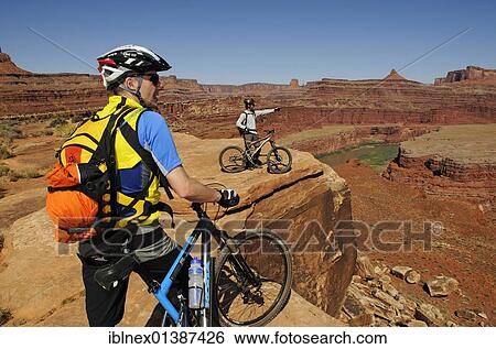 "Mountain bikers, Colorado River, White Rim Trail, Moab, Utah, USA" View Large Photo Image Stock Photograph - "Mountain bikers, Colorado River, White Rim Trail, Moab, Utah, USA". Fotosearch