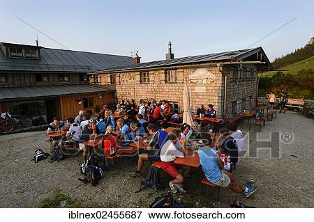 "Mountain bikers resting at Steinling Alm, Kampenwand Mountain, Chiemgau, Upper Bavaria, Bavaria, Germany, Europe" View Large Photo Image Stock Photo - "Mountain bikers resting at Steinling Alm, Kampenwand Mountain, Chiemgau, Upper Bavaria, Bavaria, Germany, Europe". Fotosearch