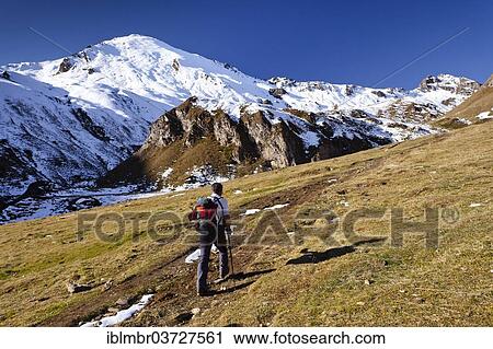"Mountain climber above the Labesebenalm mountain pasture, with Nornspitz Mountain at the rear, South Tyrol province, Trentino-Alto Adige, Italy, Europe" View Large Photo Image Stock Image - "Mountain climber above the Labesebenalm mountain pasture, with Nornspitz Mountain at the rear, South Tyrol province, Trentino-Alto Adige, Italy, Europe". Fotosearch