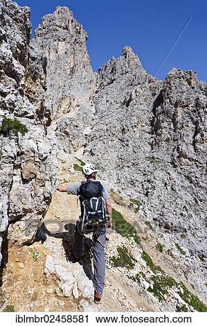 "Mountain climber ascending to the summit of Plattkofel Mountain via the Oskar-Schuster climbing route, Dolomites, Alto Adige, Italy, Europe" View Large Photo Image Stock Image - "Mountain climber ascending to the summit of Plattkofel Mountain via the Oskar-Schuster climbing route, Dolomites, Alto Adige, Italy, Europe". Fotosearch
