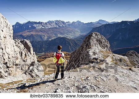 "Mountain climber descending from Peitlerkofel Mountain in Puez-Geisler Nature Park, overlooking Val Badia valley, Heiligkreuzkofel Mountain and the Civetta Group at the rear, Dolomites, Alto Adige, Italy, Europe" View Large Photo Image Stock Photography - "Mountain climber descending from Peitlerkofel Mountain in Puez-Geisler Nature Park, overlooking Val Badia valley, Heiligkreuzkofel Mountain and the Civetta Group at the rear, Dolomites, Alto Adige, Italy, Europe". Fotosearch