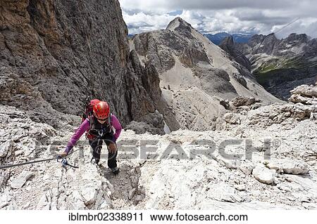 "Mountain climber during the ascent to Kesselkogel Mountain via the climbing route above Grasleiten Pass in the Rosengarten Group, Rosengarten Group at the rear, Trentino, Italy, Europe" View Large Photo Image Stock Image - "Mountain climber during the ascent to Kesselkogel Mountain via the climbing route above Grasleiten Pass in the Rosengarten Group, Rosengarten Group at the rear, Trentino, Italy, Europe". Fotosearch