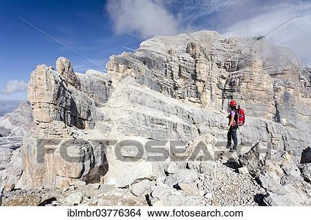 "Mountain climber on Punta Anna Mountain while ascending Tofane di Mezzo Mountain along the Via Ferrata Giuseppe di Olivieri climbing route, Ampezzo Dolomites, Belluno, Italy, Europe" View Large Photo Image Picture - "Mountain climber on Punta Anna Mountain while ascending Tofane di Mezzo Mountain along the Via Ferrata Giuseppe di Olivieri climbing route, Ampezzo Dolomites, Belluno, Italy, Europe". Fotosearch