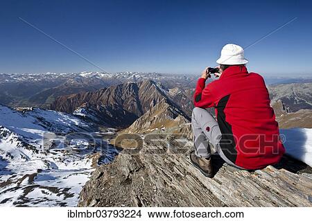 "Mountain climber on the summit of Wilde Kreuzspitze Mountain with views over the Pfunderer Mountains towards the Wipptal valley, Eisacktal valley, Alto Adige, Italy, Europe" View Large Photo Image Picture - "Mountain climber on the summit of Wilde Kreuzspitze Mountain with views over the Pfunderer Mountains towards the Wipptal valley, Eisacktal valley, Alto Adige, Italy, Europe". Fotosearch