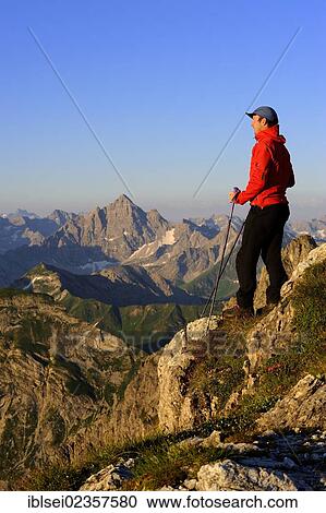 "Mountain climber with a mountain panorama, Geisshorn Mountain, Tannheim Valley, Tyrol, Austria, Europe" View Large Photo Image Stock Image - "Mountain climber with a mountain panorama, Geisshorn Mountain, Tannheim Valley, Tyrol, Austria, Europe". Fotosearch