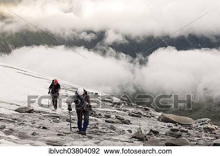 "Mountain climbers ascending the Grande Mesule, Finkenberg, Zillertal, Austria, Europe" View Large Photo Image Stock Image - "Mountain climbers ascending the Grande Mesule, Finkenberg, Zillertal, Austria, Europe". Fotosearch