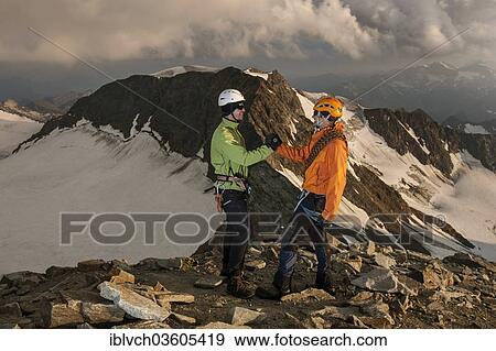 "Mountain climbers congratulating one another following the ascent to the summit of Wilder Pfaff Mountain, Stubai Valley, Stubai Alps, Neustift im Stubaital, Tyrol, Austria, Europe" View Large Photo Image Stock Photo - "Mountain climbers congratulating one another following the ascent to the summit of Wilder Pfaff Mountain, Stubai Valley, Stubai Alps, Neustift im Stubaital, Tyrol, Austria, Europe". Fotosearch