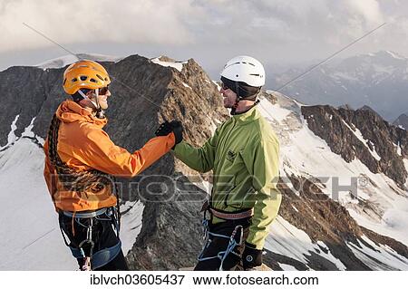 "Mountain climbers congratulating one another following the ascent to the summit of Wilder Pfaff Mountain, Stubai Valley, Stubai Alps, Tyrol, Austria, Europe" View Large Photo Image Stock Photo - "Mountain climbers congratulating one another following the ascent to the summit of Wilder Pfaff Mountain, Stubai Valley, Stubai Alps, Tyrol, Austria, Europe". Fotosearch