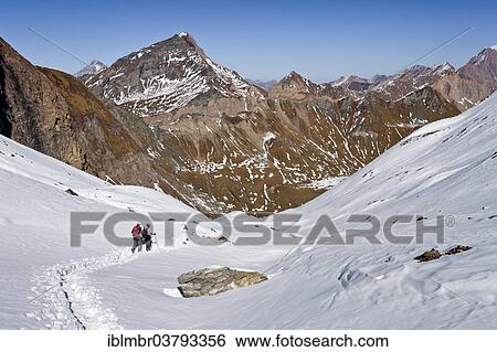 "Mountain climbers on Rauhtaljoch Pass, during the descent from Wilde Kreuzspitze Mountain in the Pfunderer Mountains, with the Valsertal valley below, Eisacktal, Province of Alto Adige, Italy, Europe" View Large Photo Image Stock Photograph - "Mountain climbers on Rauhtaljoch Pass, during the descent from Wilde Kreuzspitze Mountain in the Pfunderer Mountains, with the Valsertal valley below, Eisacktal, Province of Alto Adige, Italy, Europe". Fotosearch