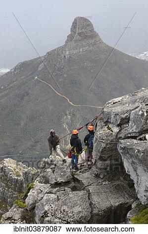 "Mountain climbers on Table Mountain, overlooking Lion's Head, Cape Town, Western Cape, South Africa, Africa" View Large Photo Image Stock Photo - "Mountain climbers on Table Mountain, overlooking Lion's Head, Cape Town, Western Cape, South Africa, Africa". Fotosearch
