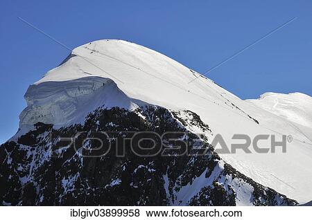 Stock Photo - "Mountain climbers on the Breithorn, 4164 m, during high season, Zermatt, Canton of Valais, Switzerland, Europe". Fotosearch