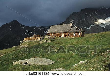 Stock Photography - "Mountain hut Refuge de la Dent Parrachee, Mt Le Rateau, left, and Mt Pointe de l'Echelle, right, at back, Vanoise Nationalpark, Haute Savoie, France, Europe". Fotosearch