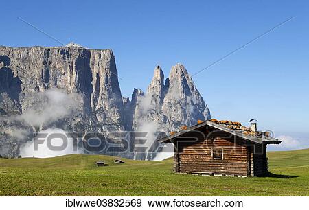 Stock Photo - "Mountain hut, Schlern Massif or Sciliar Massif, Schlern or Sciliar, Seiser Alm or Alpe di Siusi, high alpine pasture, South Tyrol, Italy, Europe". Fotosearch